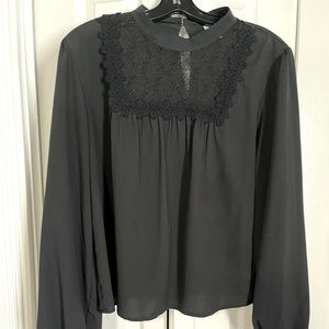 Black blouse with lace inset detail